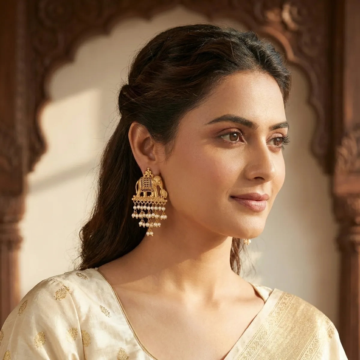 Gold-Toned Traditional Elephant Jhumka Earrings With Pearl Drops