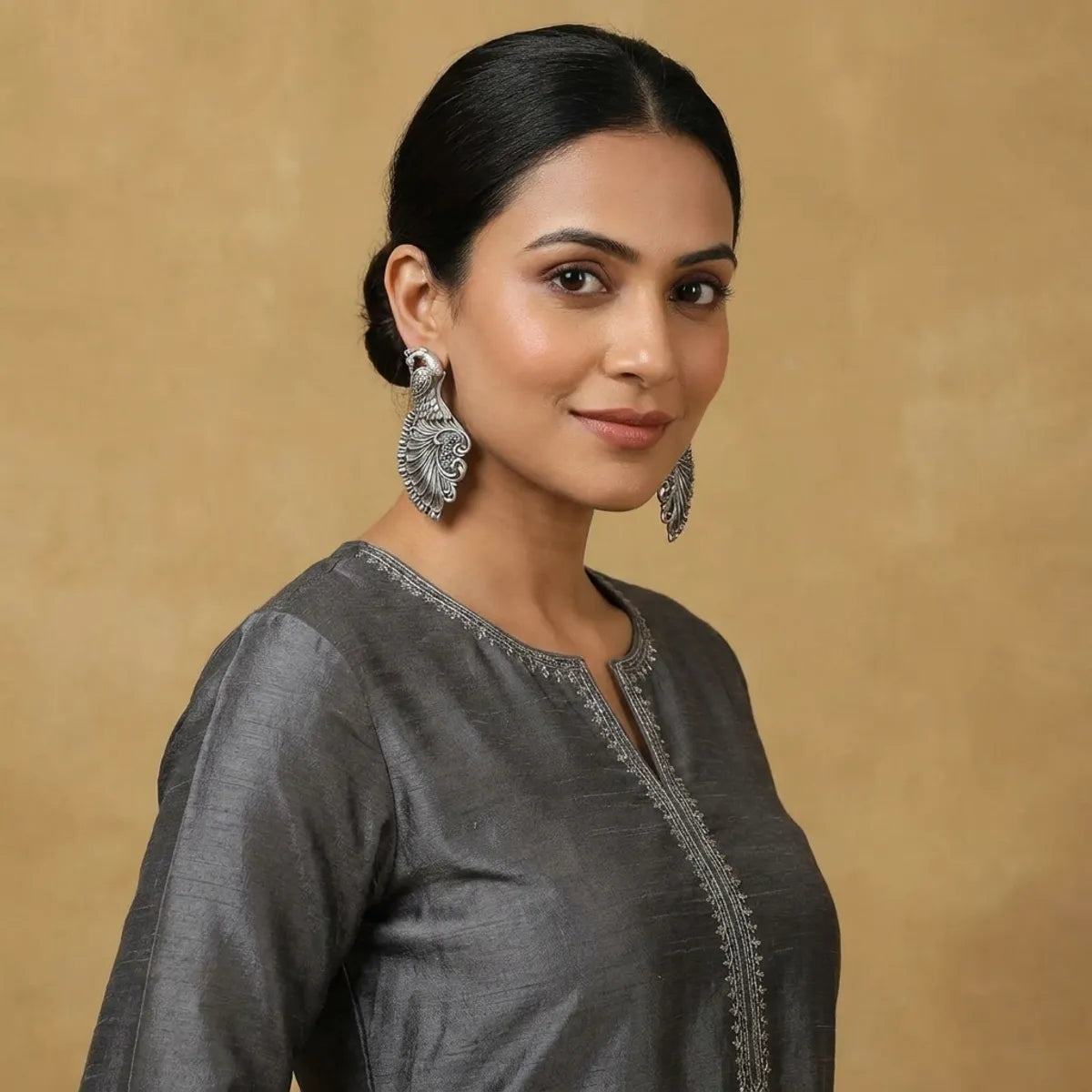 Silver-Toned Handcrafted Peacock Earrings